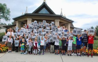 Selfreliance Federal Credit Union distributes book bags